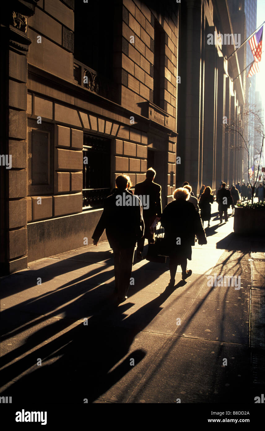 Business people going to work, Wall Street, New York, USA Stock Photo
