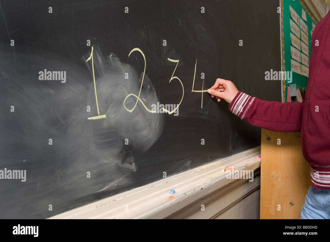 Student Writing Blackboard Stock Photo Alamy