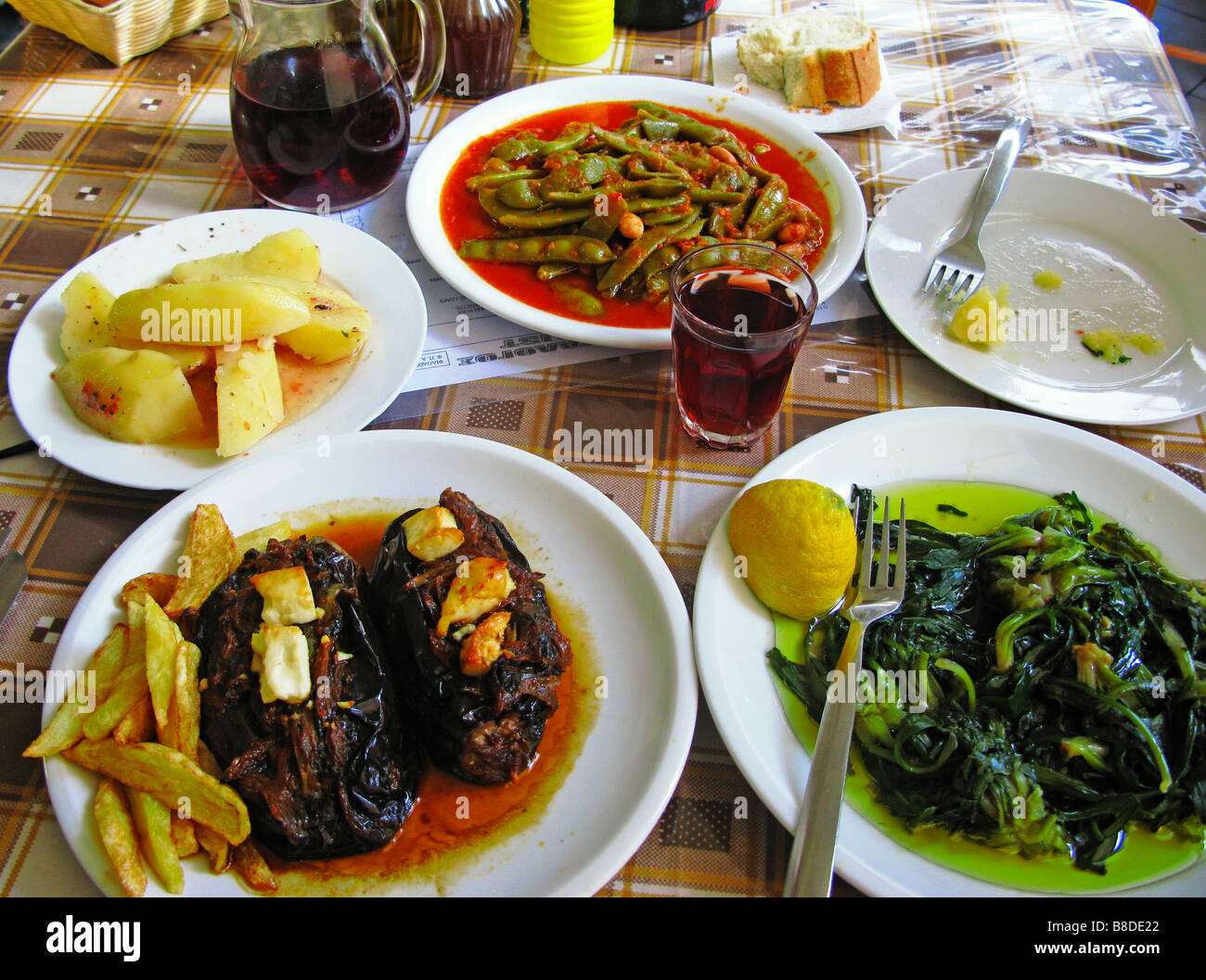 Greek Cuisine Fresh Eggplants in Tomato sauce Green Beans and Vleeta