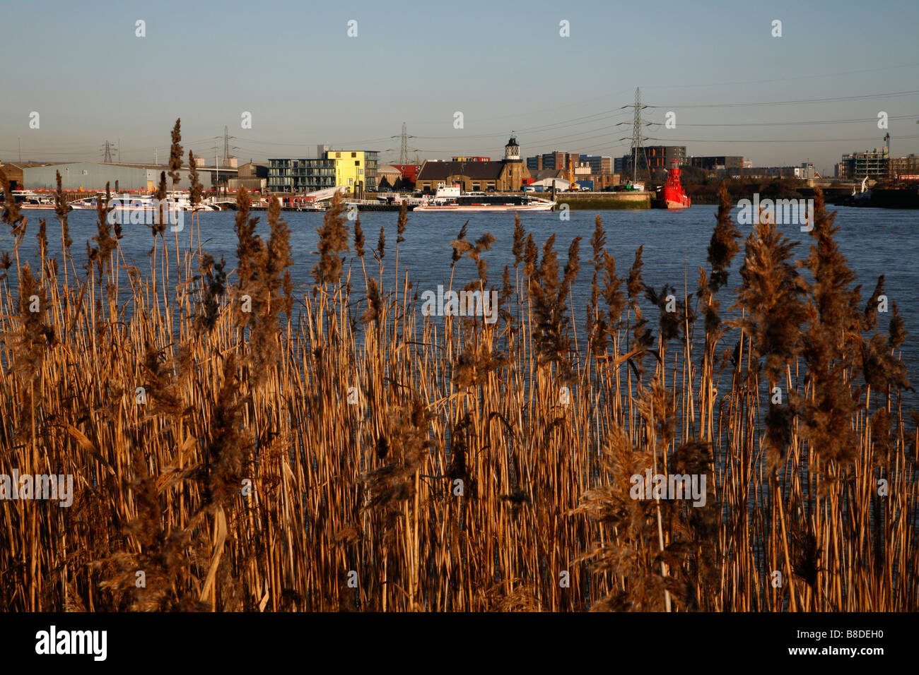 View across the River Thames from Greenwich Peninsula to the mouth of the River Lea and Trinity Buoy Wharf, Leamouth, London Stock Photo