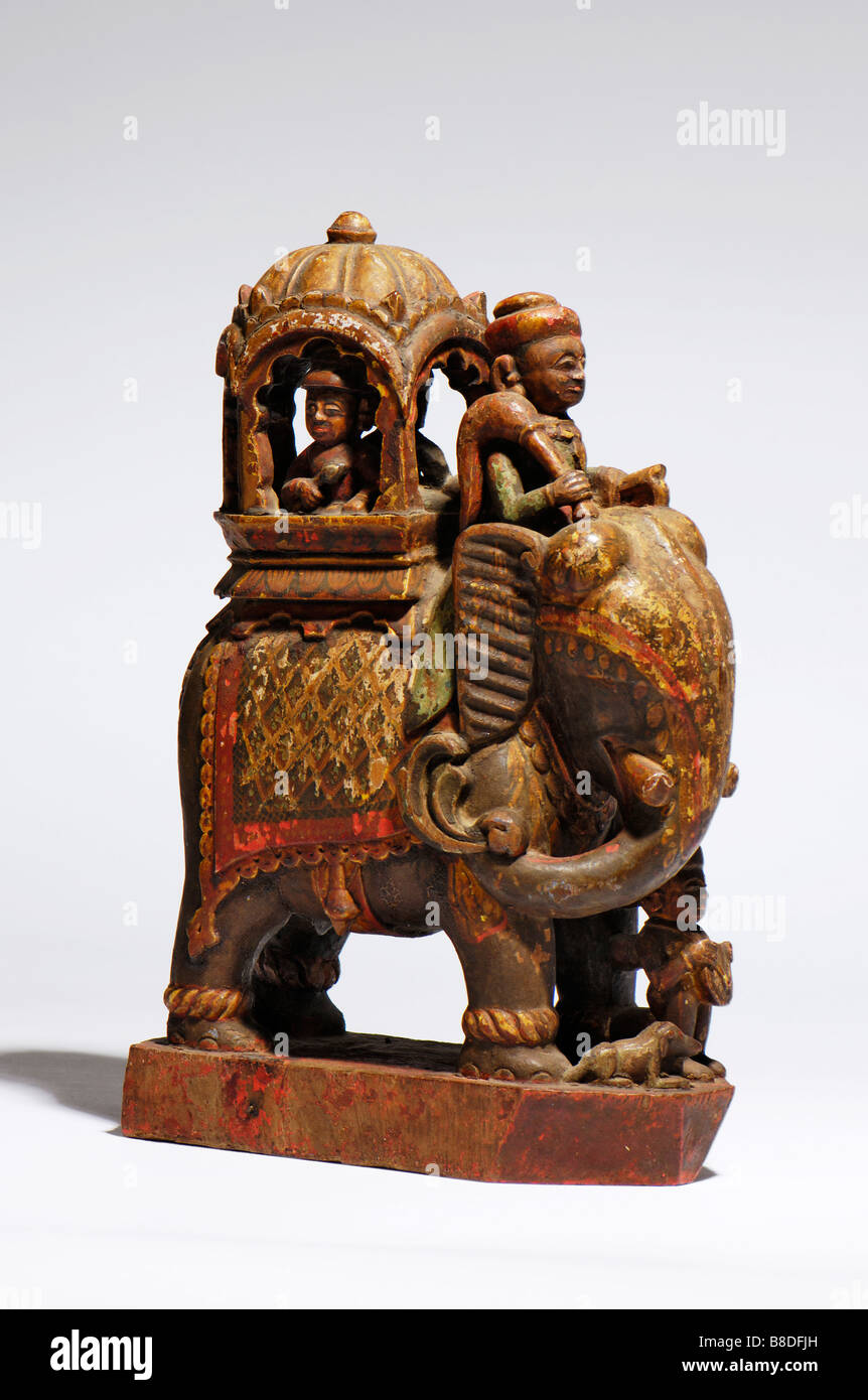An Antique Indian carved wood and painted caparisoned elephant Stock Photo