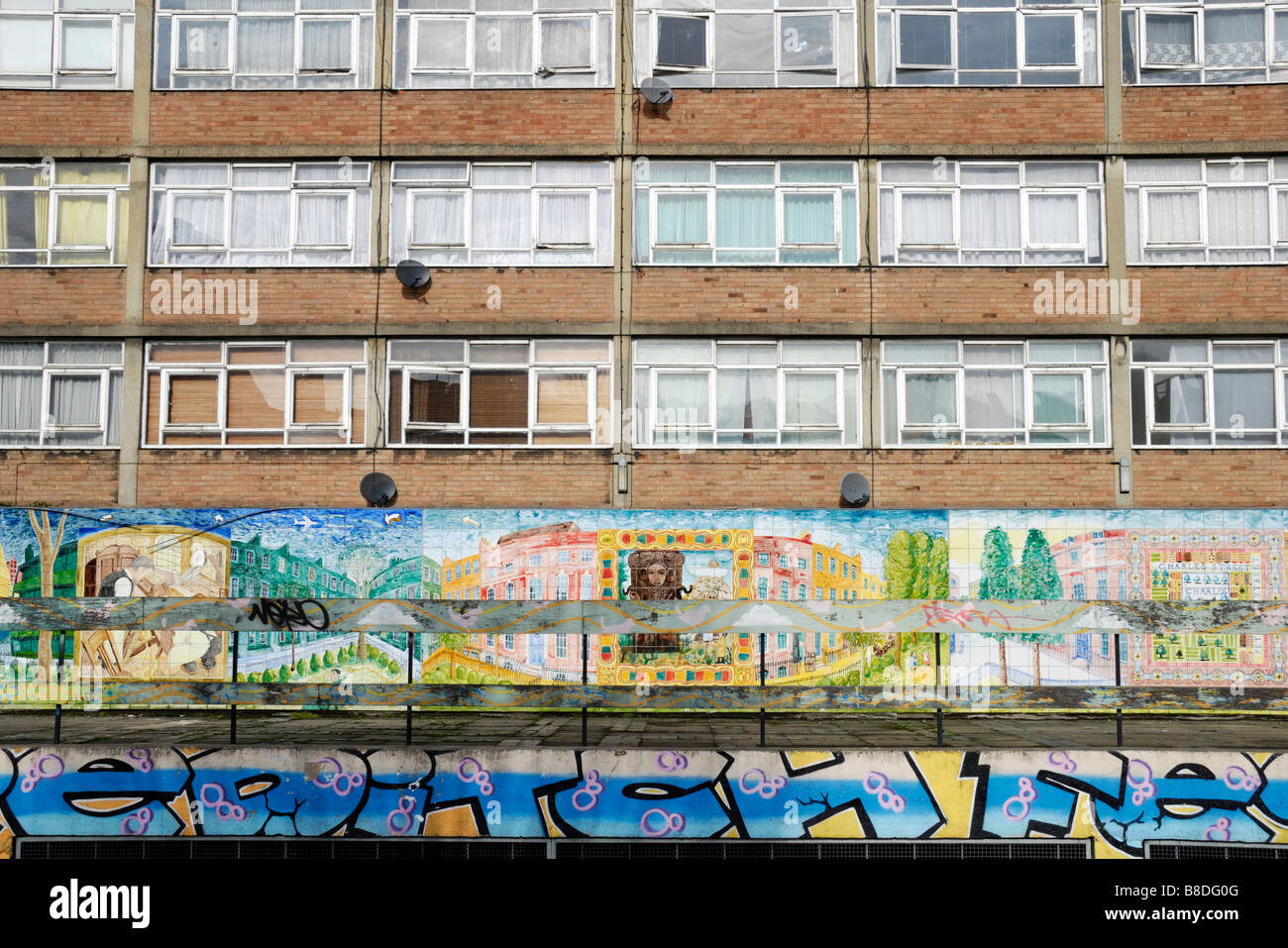 Council housing block and mural painting Stock Photo