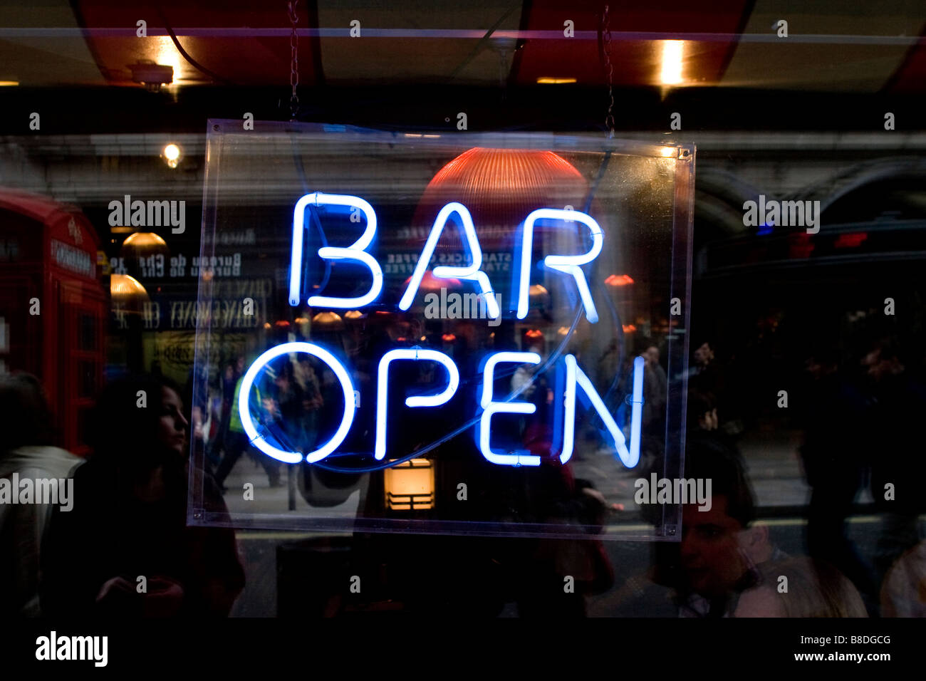 Neon blue 'Bar Open' sign in Leicester Square, London, UK Stock Photo