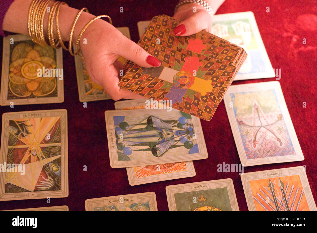 Reading tarot cards on a table Stock Photo Alamy