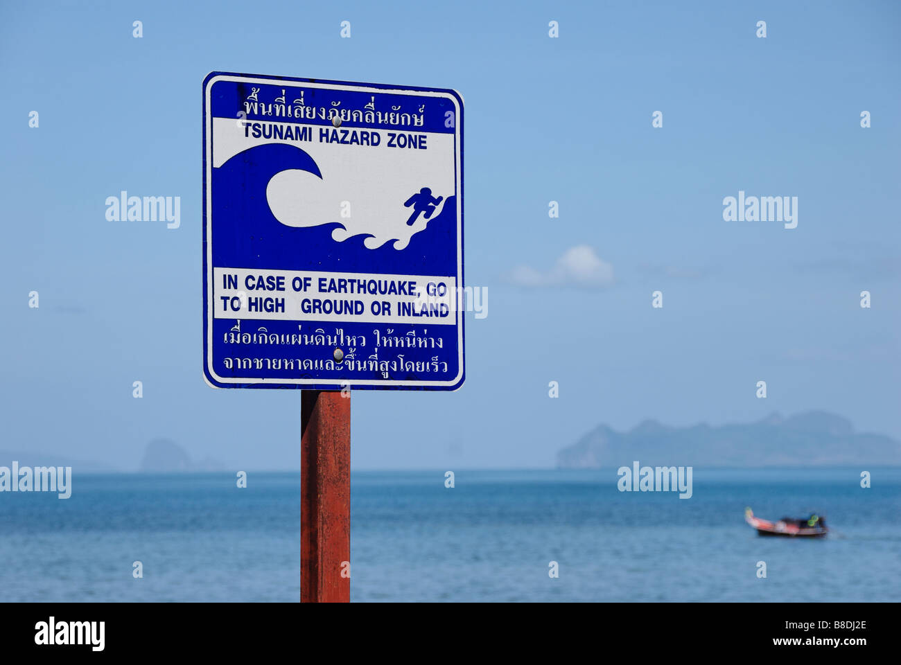 Tsunami hazard zone sign on Koh Libong island Thailand Stock Photo