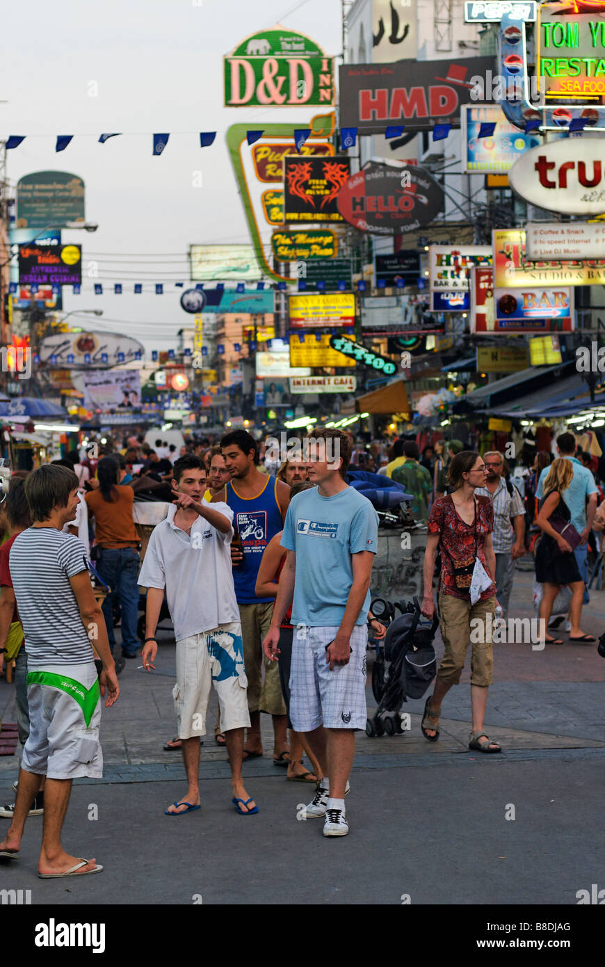 Young lads going for a night out along Khao San Road in Bangkok Thailand Stock Photo