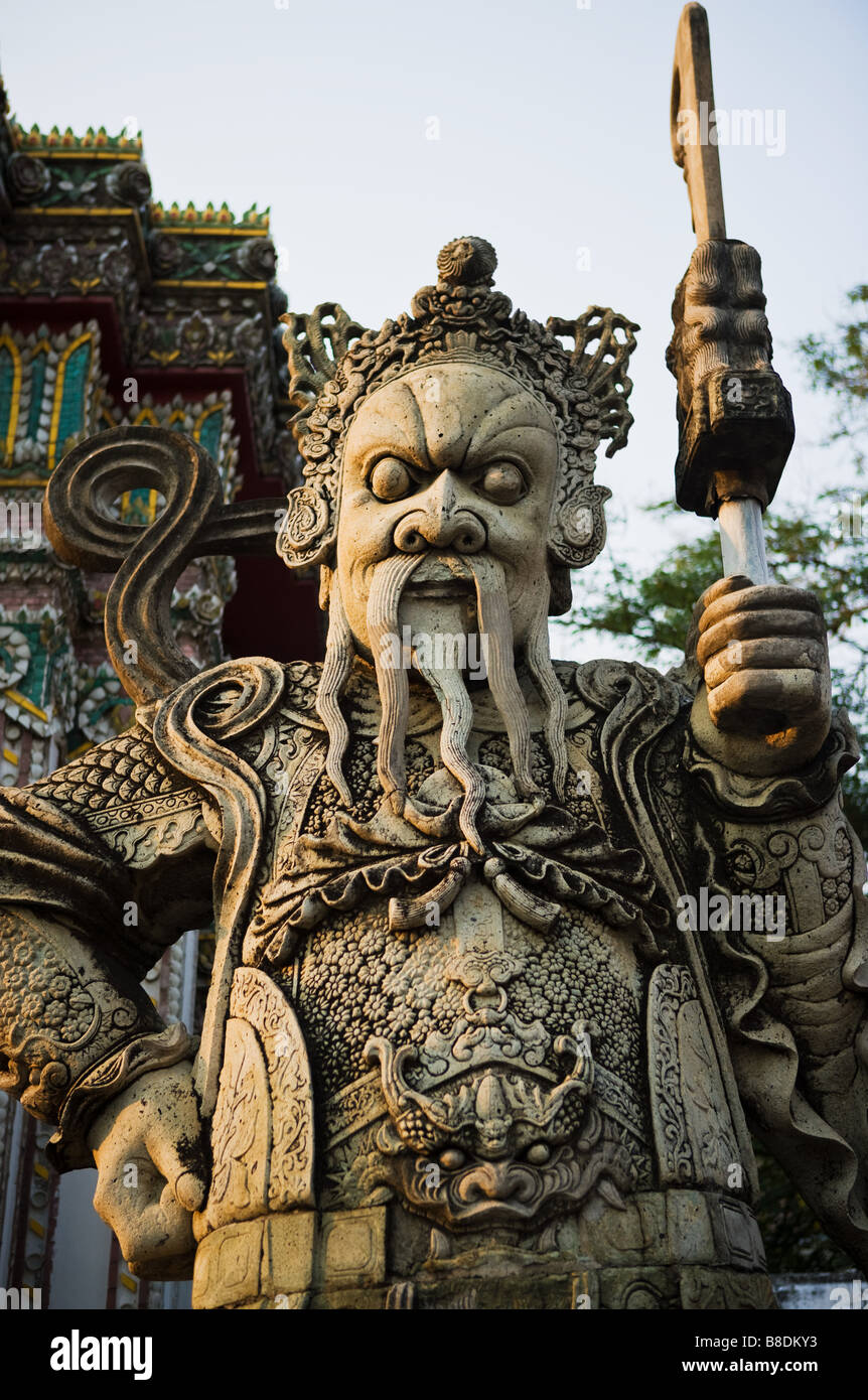 Guardian statue at wat pho temple Stock Photo