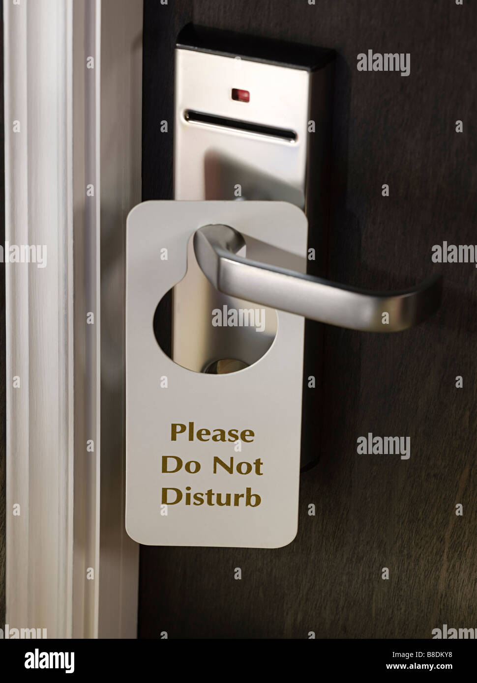 Do not disturb sign on a hotel room door Stock Photo