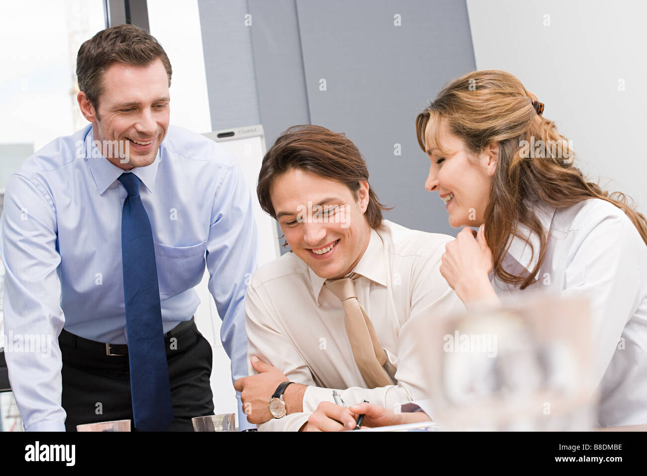 Working Smiling Smiling team worker stand hi-res stock photography and images - Alamy
