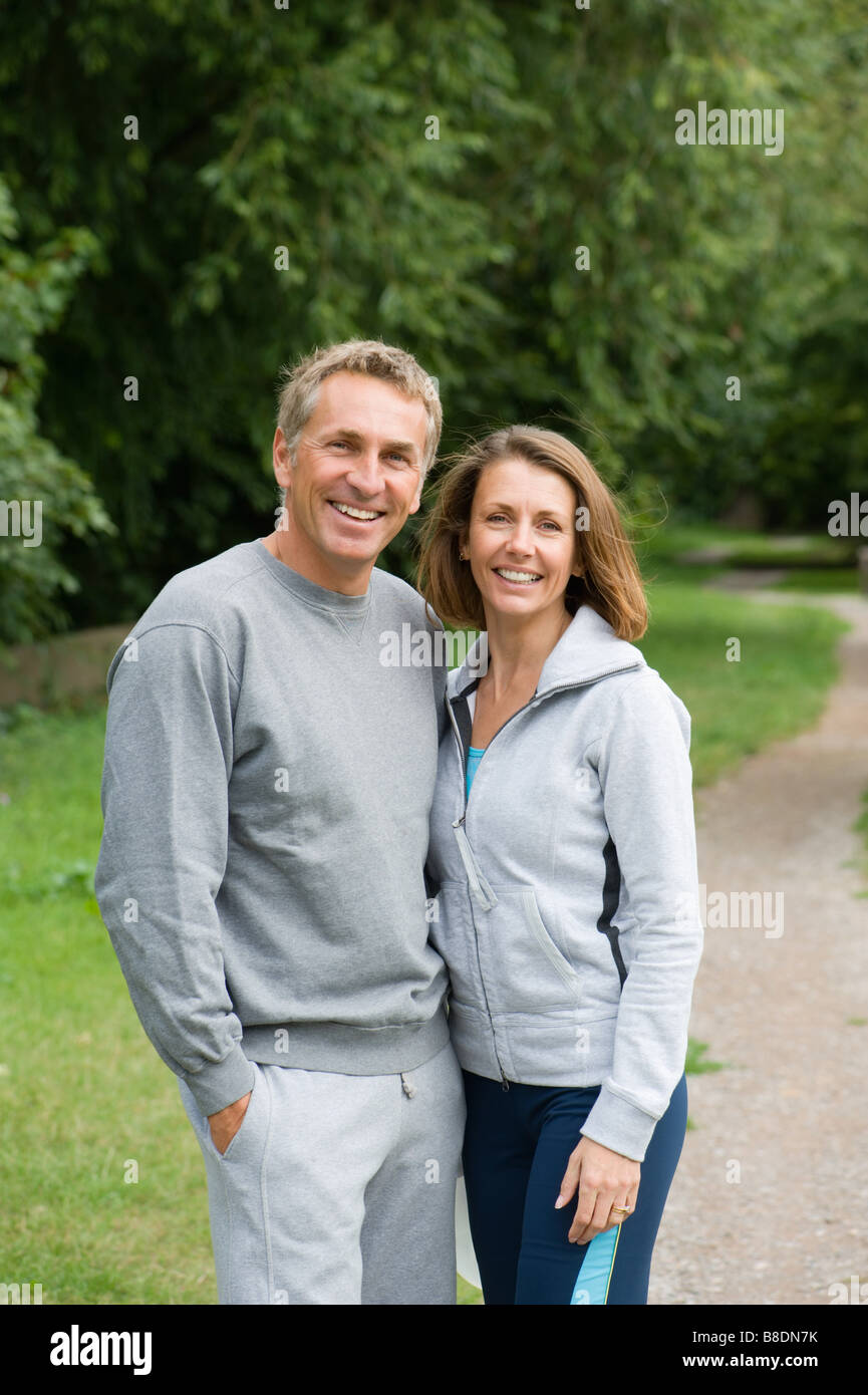 Mature couple wearing tracksuits Stock Photo Alamy