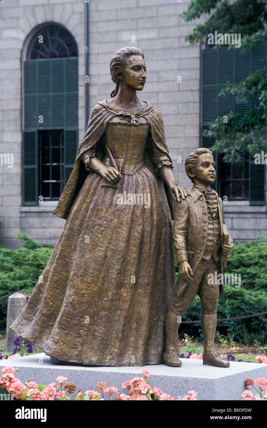 Abigail Adams with her son John Quincy Adams statue outside the Adams family's church in Quincy Massachusetts. Photograph Stock Photo