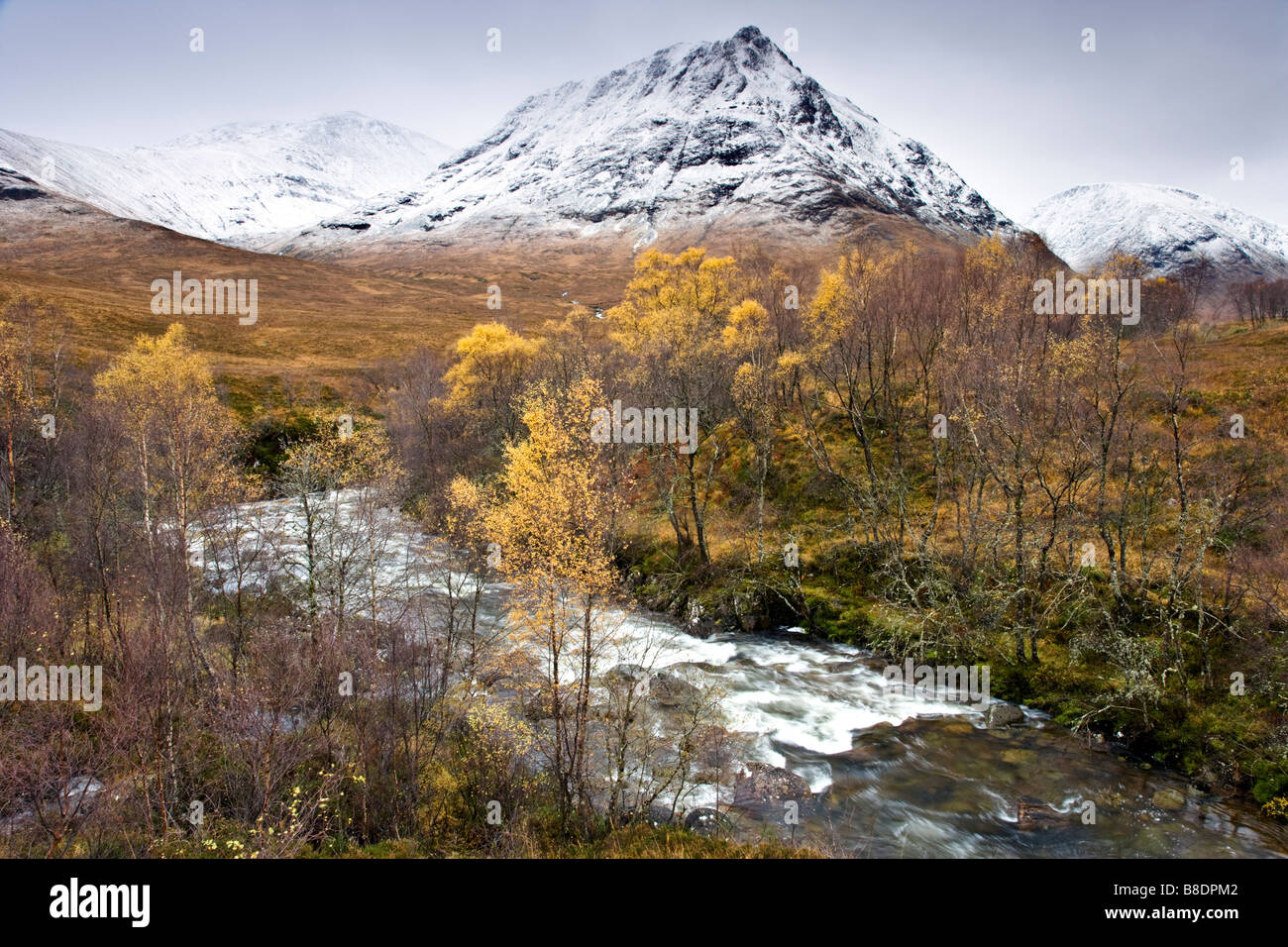 Scottish Landscape of Snow covered Mountains near Glen Coe. Stock Photo