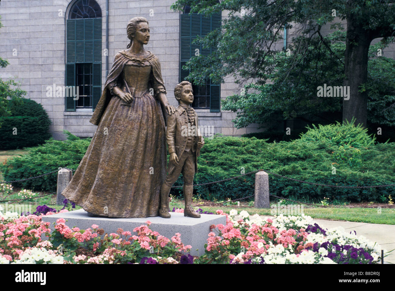 Abigail Adams with her son John Quincy Adams memorial statue outside the Adams family's church in Quincy Massachusetts. Photograph Stock Photo