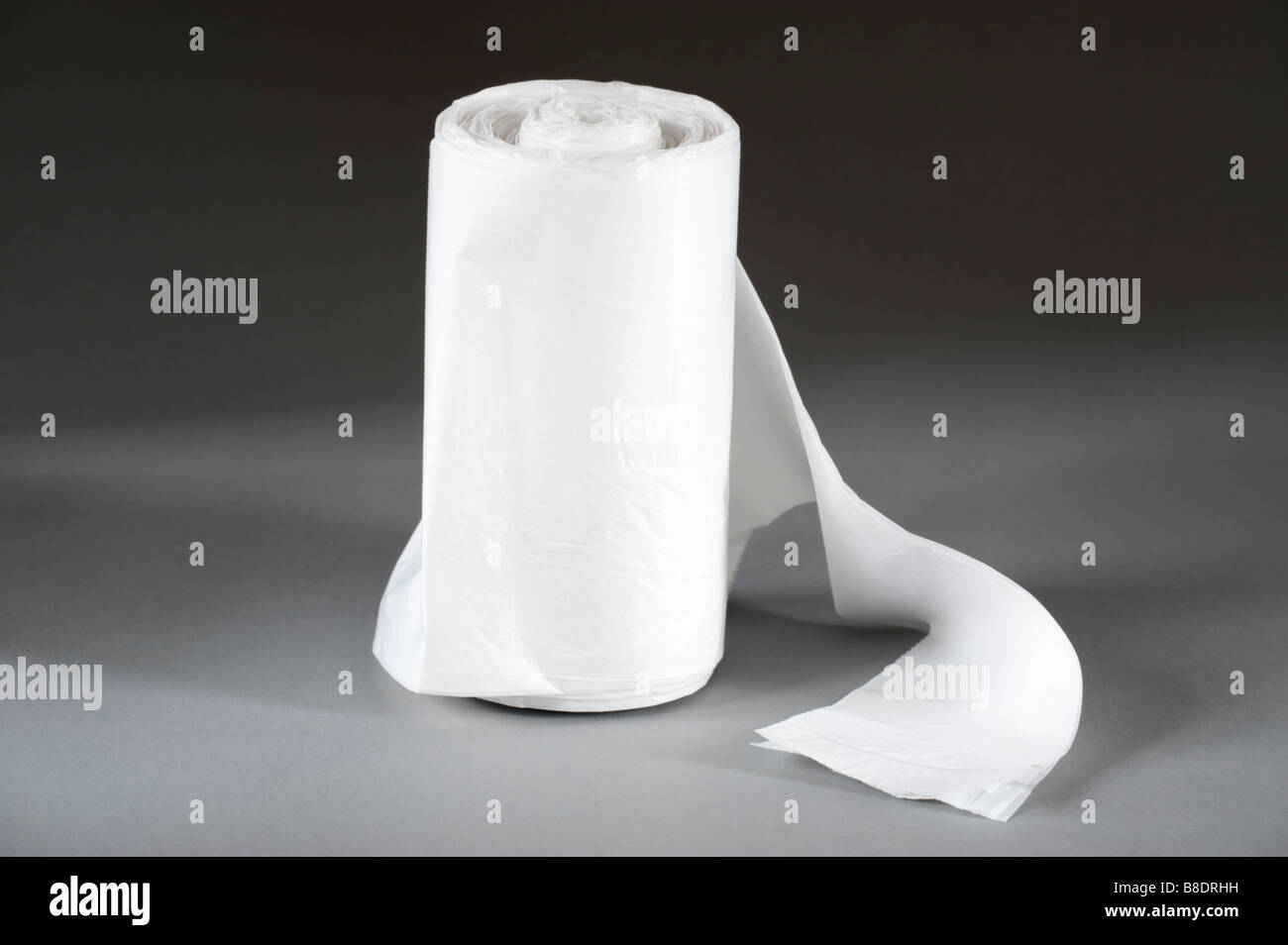 Roll of white plastic refuse bags Stock Photo
