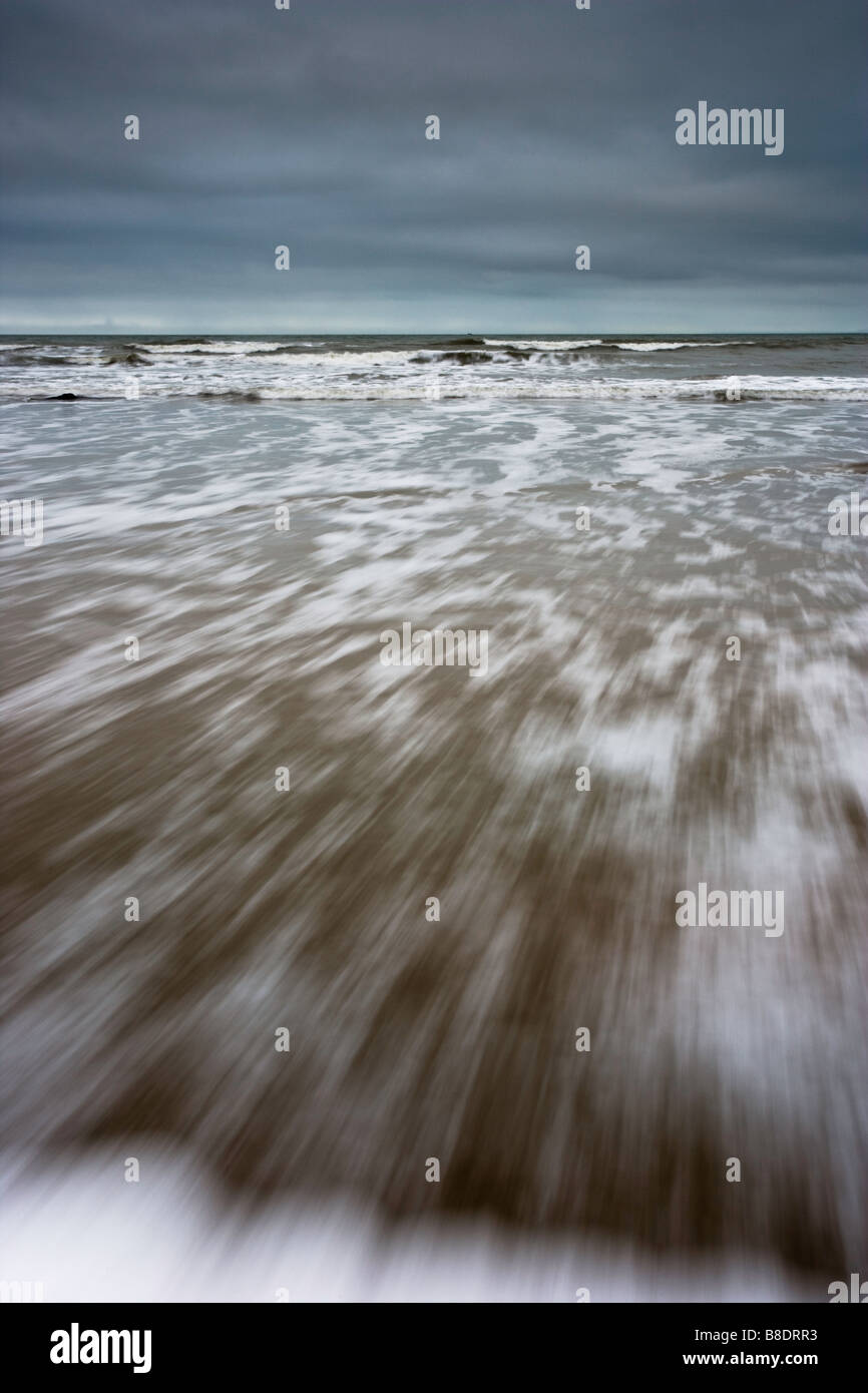 Waves crashing on a beach. Stock Photo