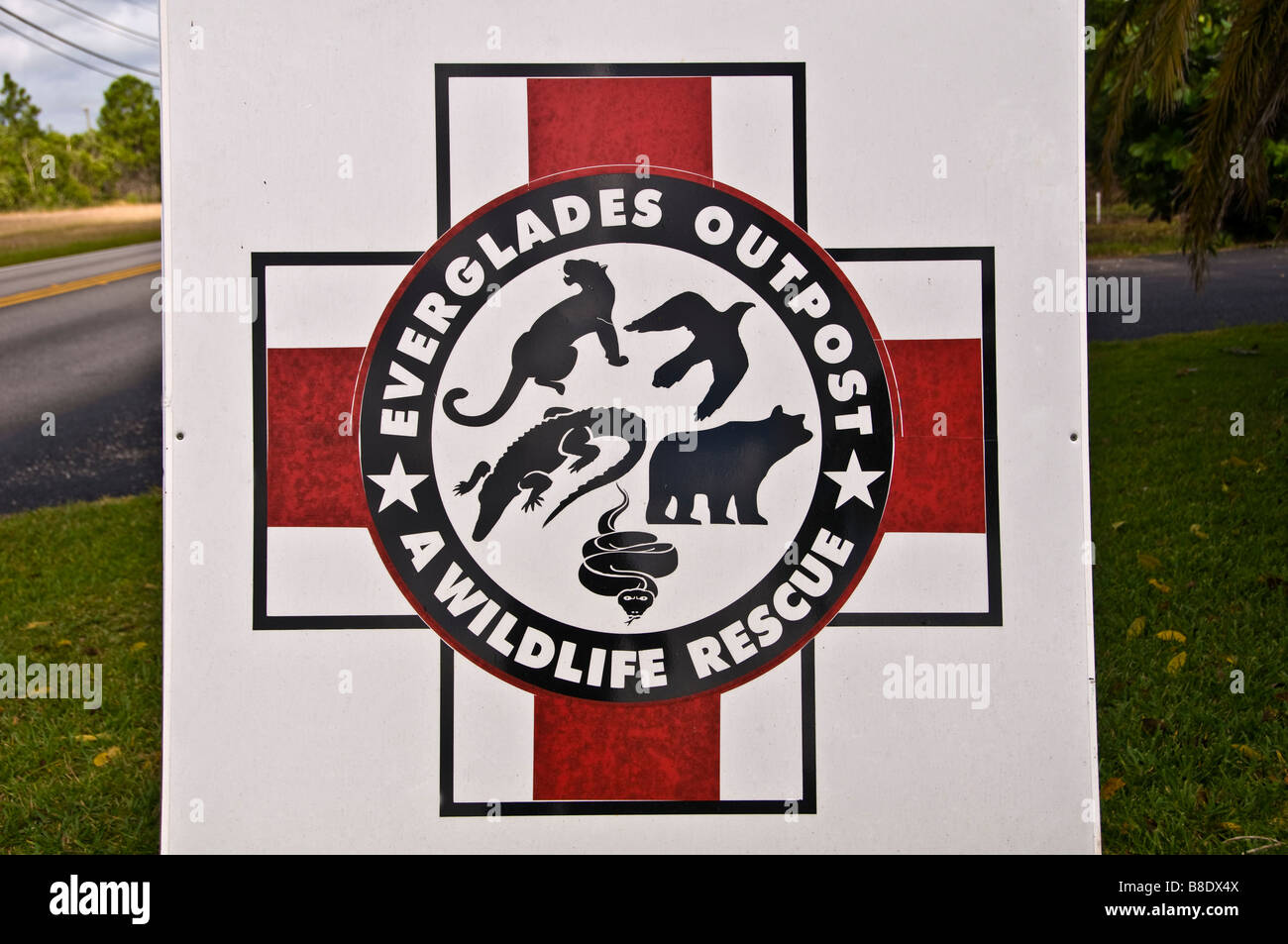 Everglades Outpost A Wildlife Rescue sign red cross Homestead Florida Stock Photo