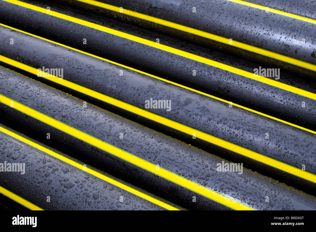 Pattern formed by natural gas pipes stack. Stock Photo