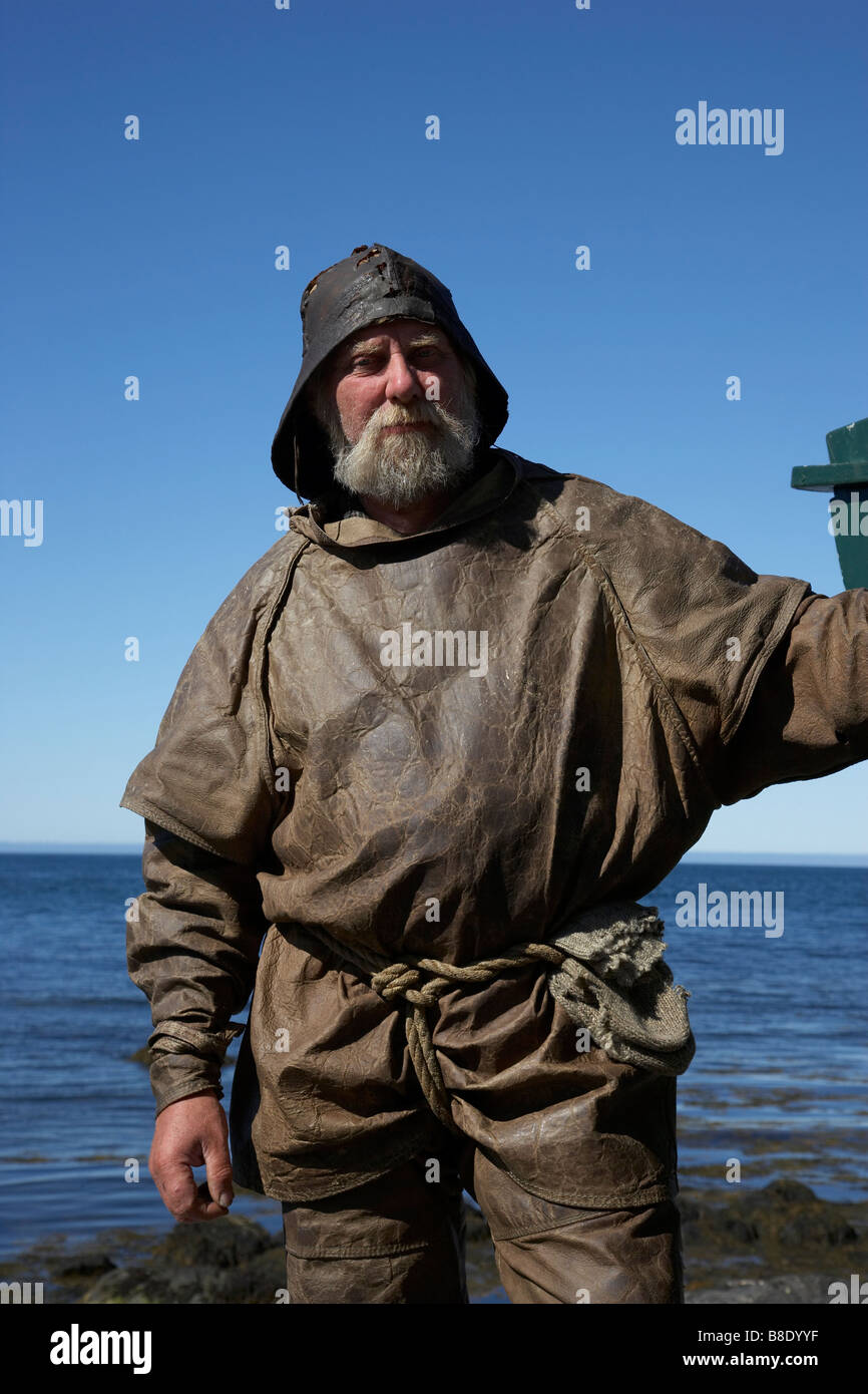 Fisherman in old gear, Bolungarvik town, West Fjords, Iceland Stock Photo
