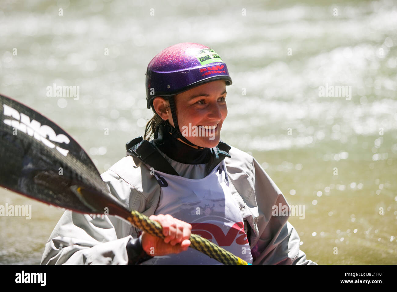 Female kayaker competes on the Arkansas River during the annual Fibark Festival, Salida, Colorado, USA Stock Photo