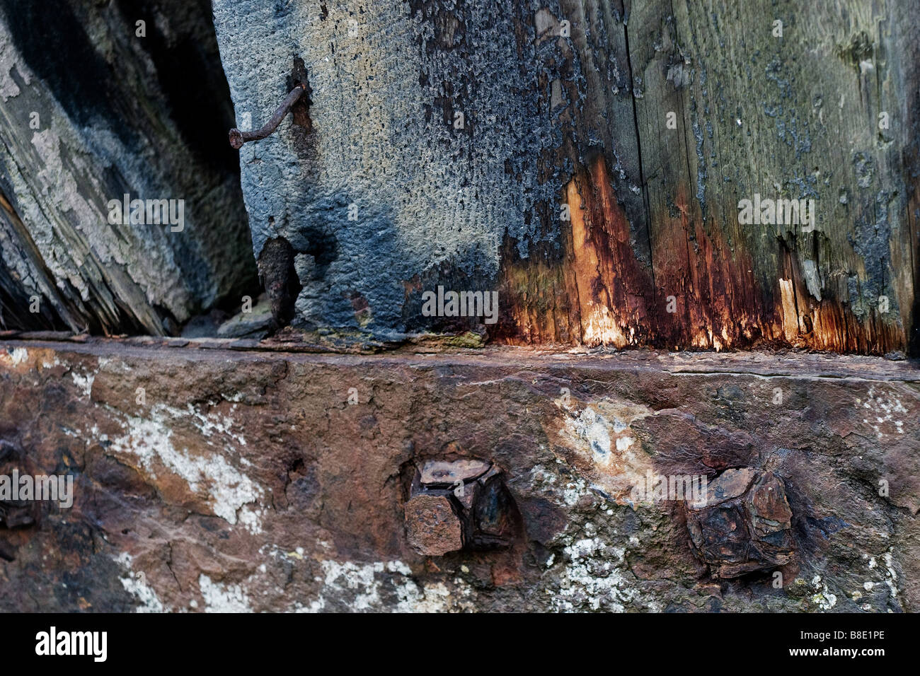 Corroded metal and rotting wood. Stock Photo