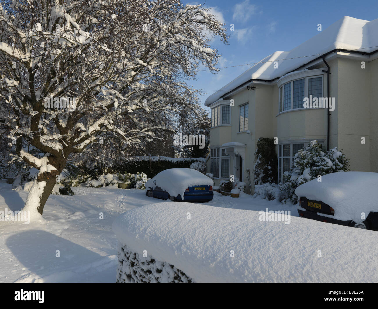 Detached House After Heavy Snowfall Surrey England Stock Photo