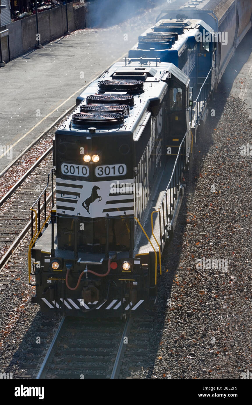 A freight train locomotive in transit. Stock Photo