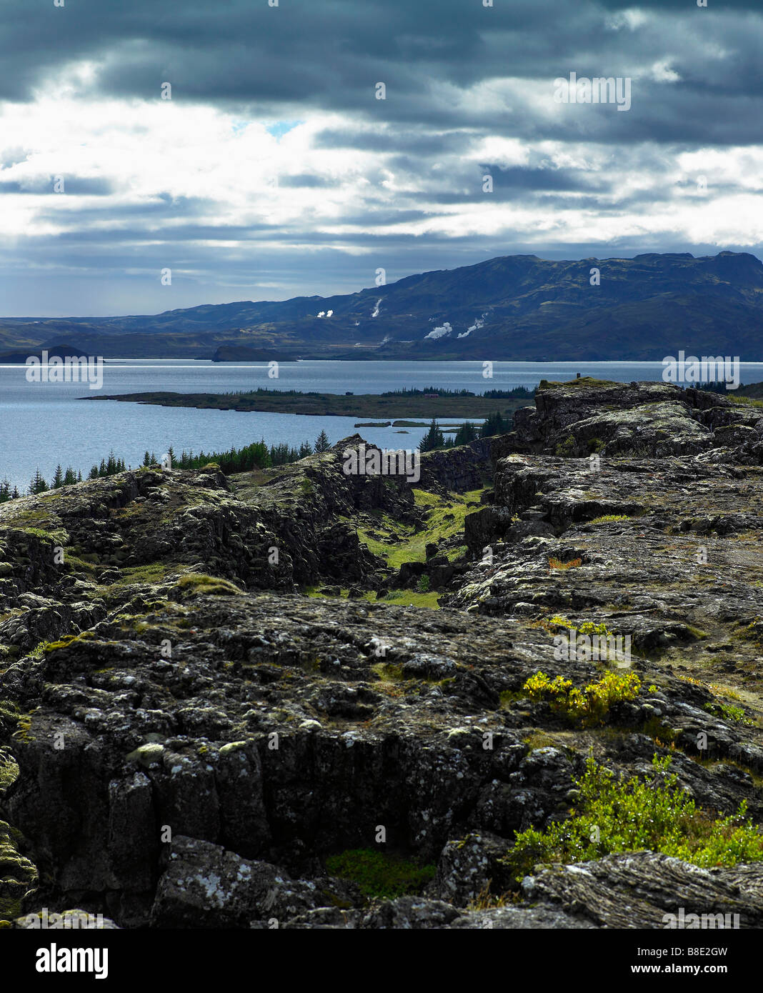 Lava landscape with earthquake cracks and Lake Thingvellir, Thingvellir National Park, Iceland Stock Photo