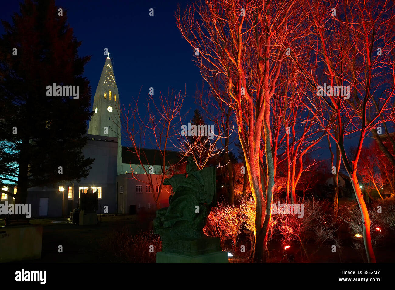 Lights illuminated, rear side of the Einar Jonsson Art Gallery with Hallgrimskirkja Church, Winter Festival, Reykjavik, Iceland Stock Photo