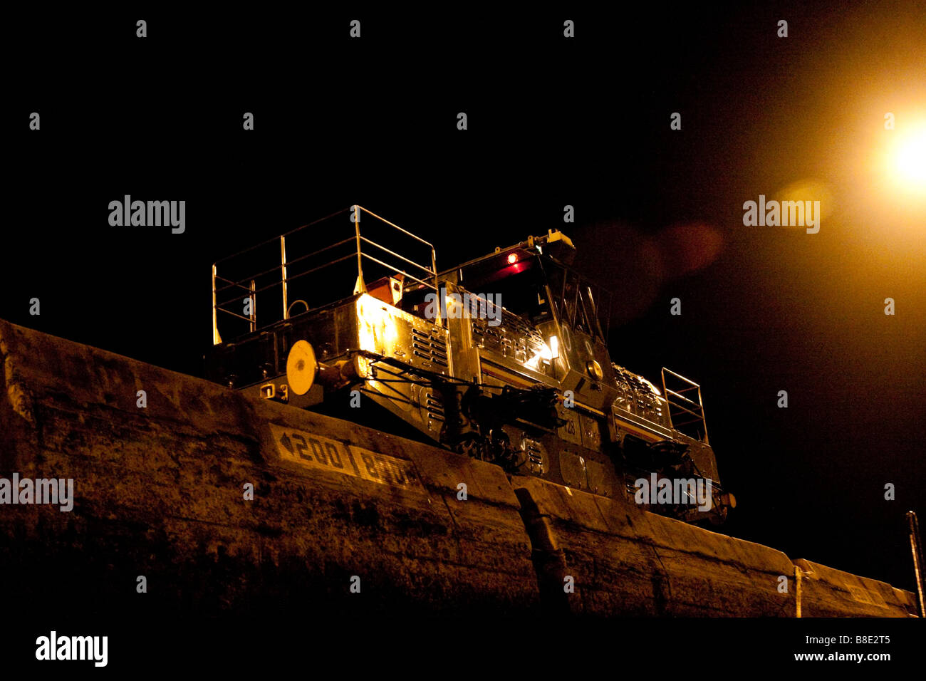 Panama Canal mule at Miraflores Locks, night shot. Panama City