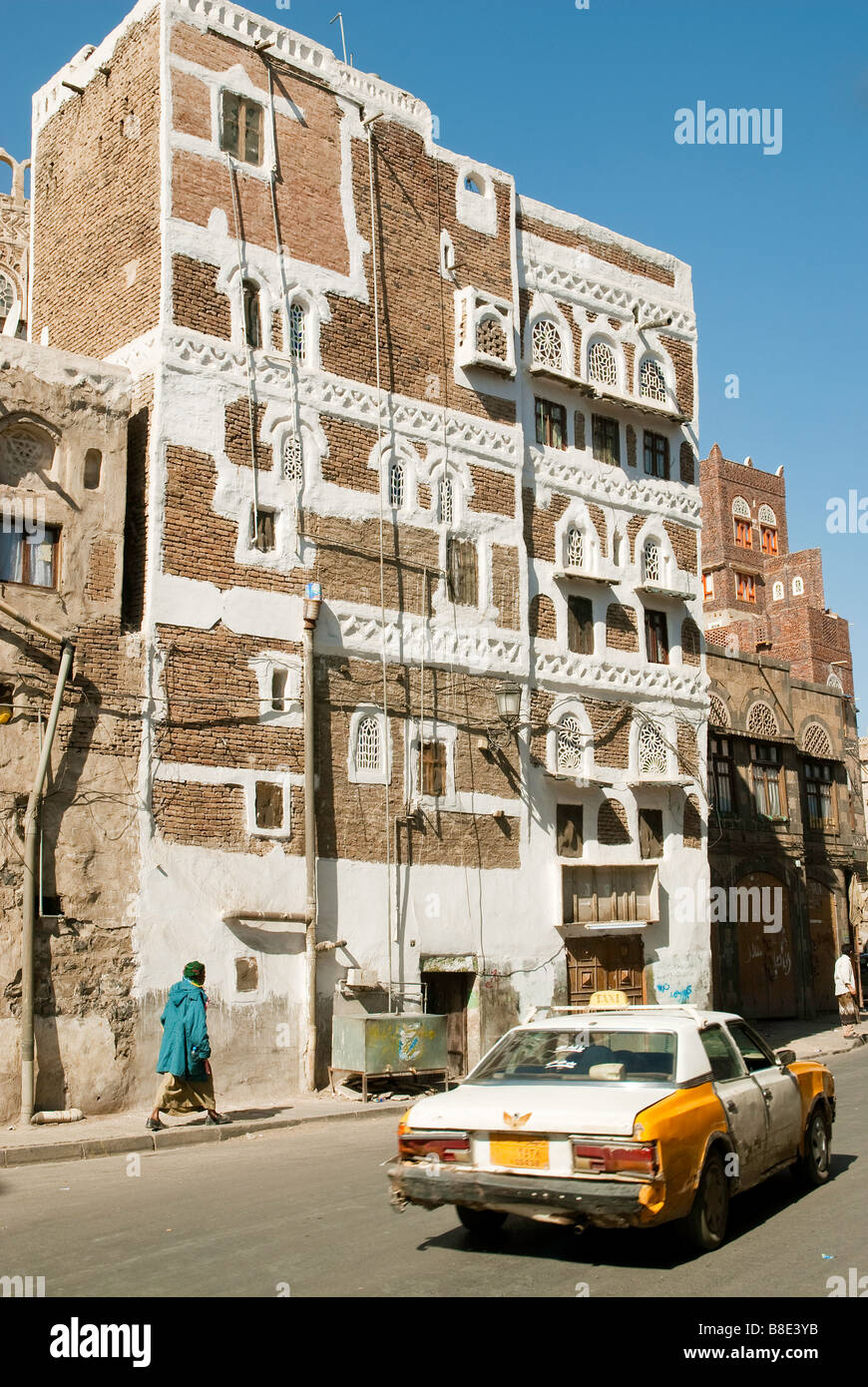 sanaa city yemen urban street scene people taxi Stock Photo