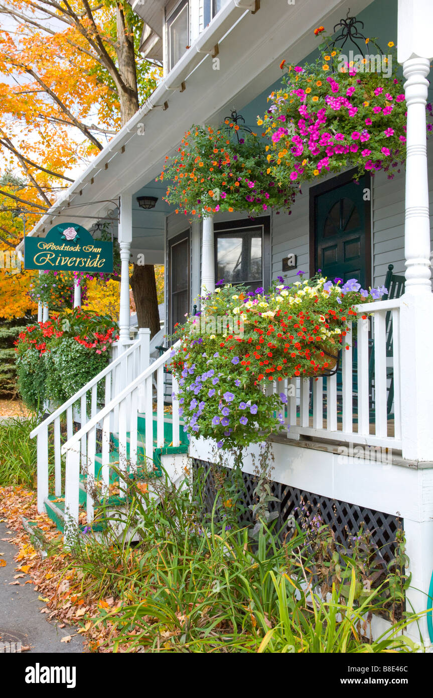 The verandah of the Woodstock Inn Riverside decorated with flowers Woodstock New Hampshire USA