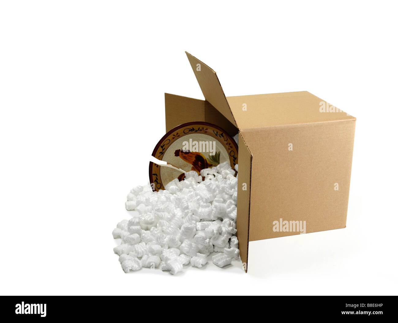 Open Cardboard Shipping Box with Broken Dinner Plate Stock Photo