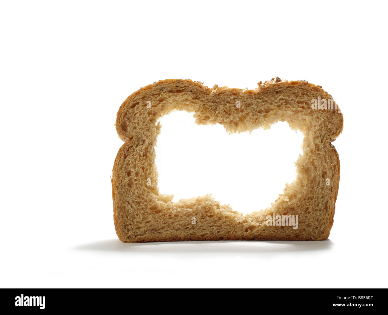 Piece of Sliced Bread with Center Missing Stock Photo