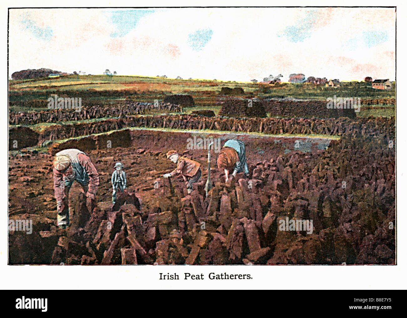 Irish Peat Gatherers Edwardian coloured photograph of Irish farmers cutting peat Stock Photo