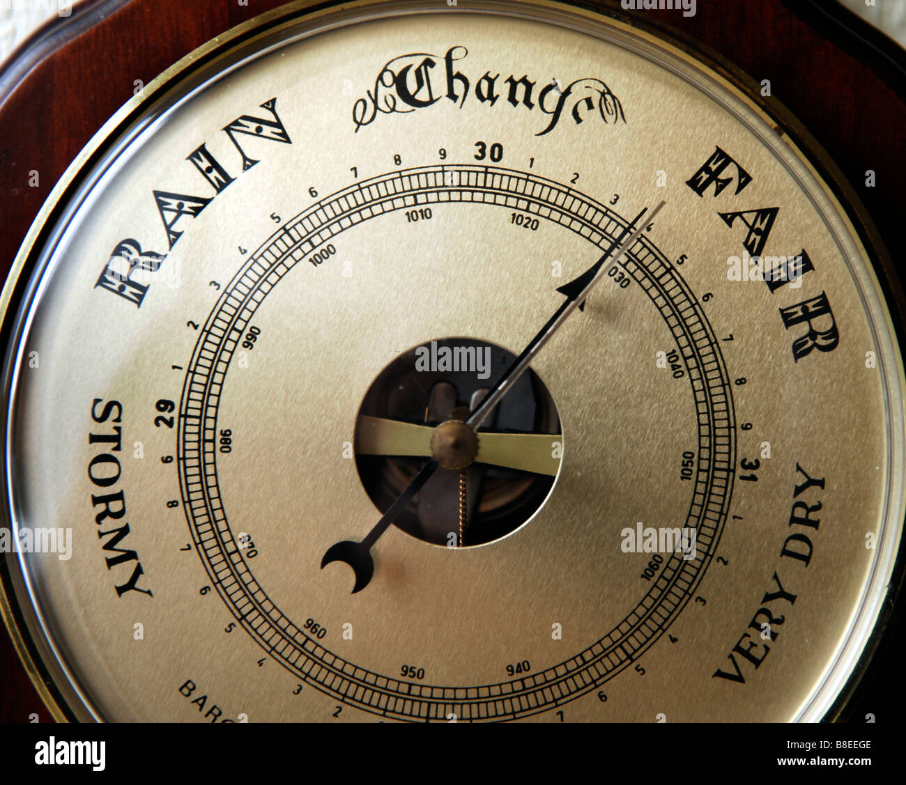A barometer used for weather forecasting measuring the barometric pressure Stock Photo