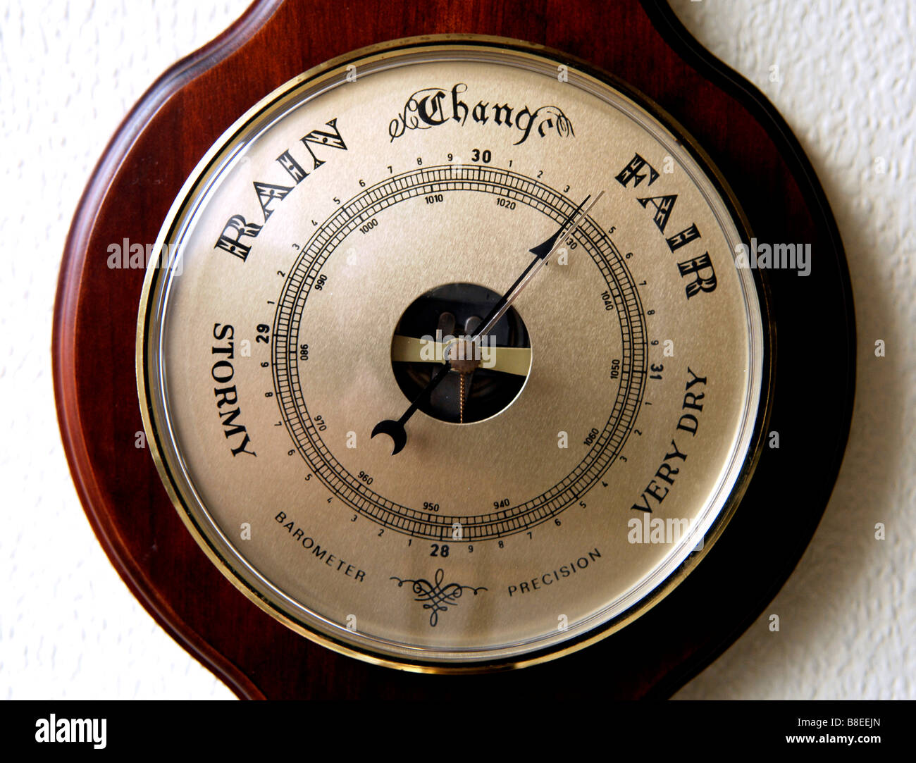 A barometer used for weather forecasting measuring the barometric pressure Stock Photo