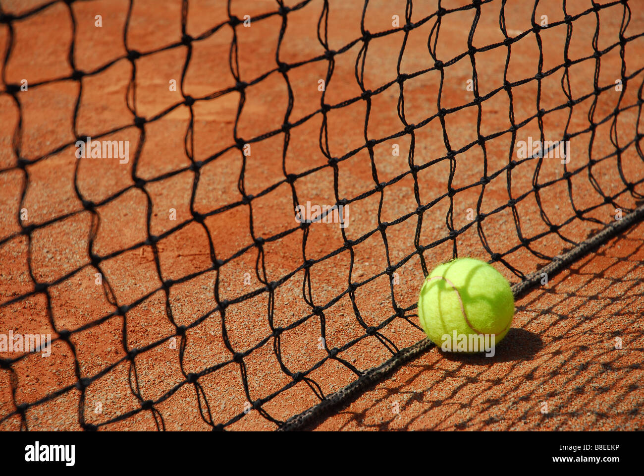 tennis ball and net Stock Photo Alamy