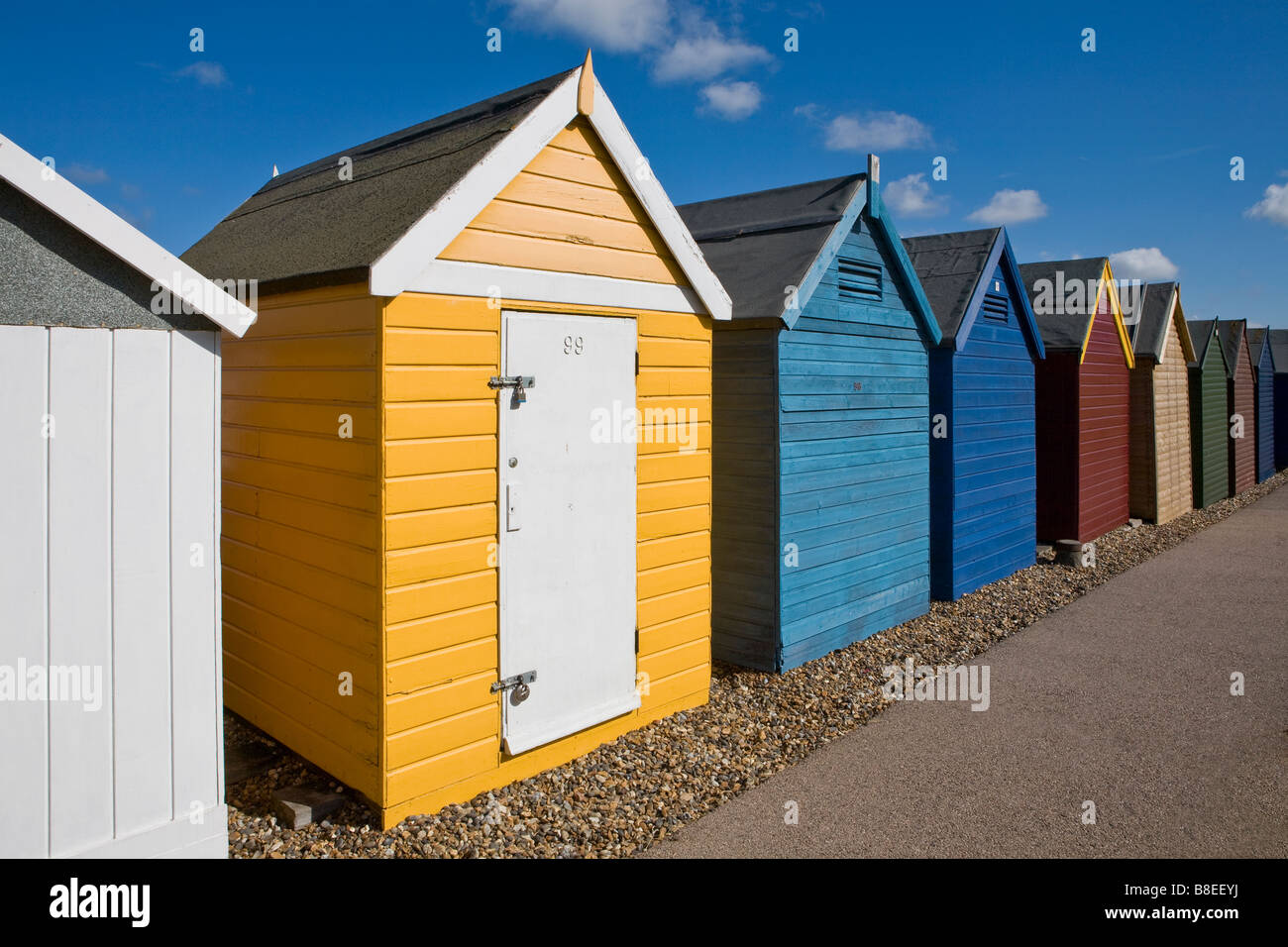 Row of beach huts, South Coast England UK Stock Photo