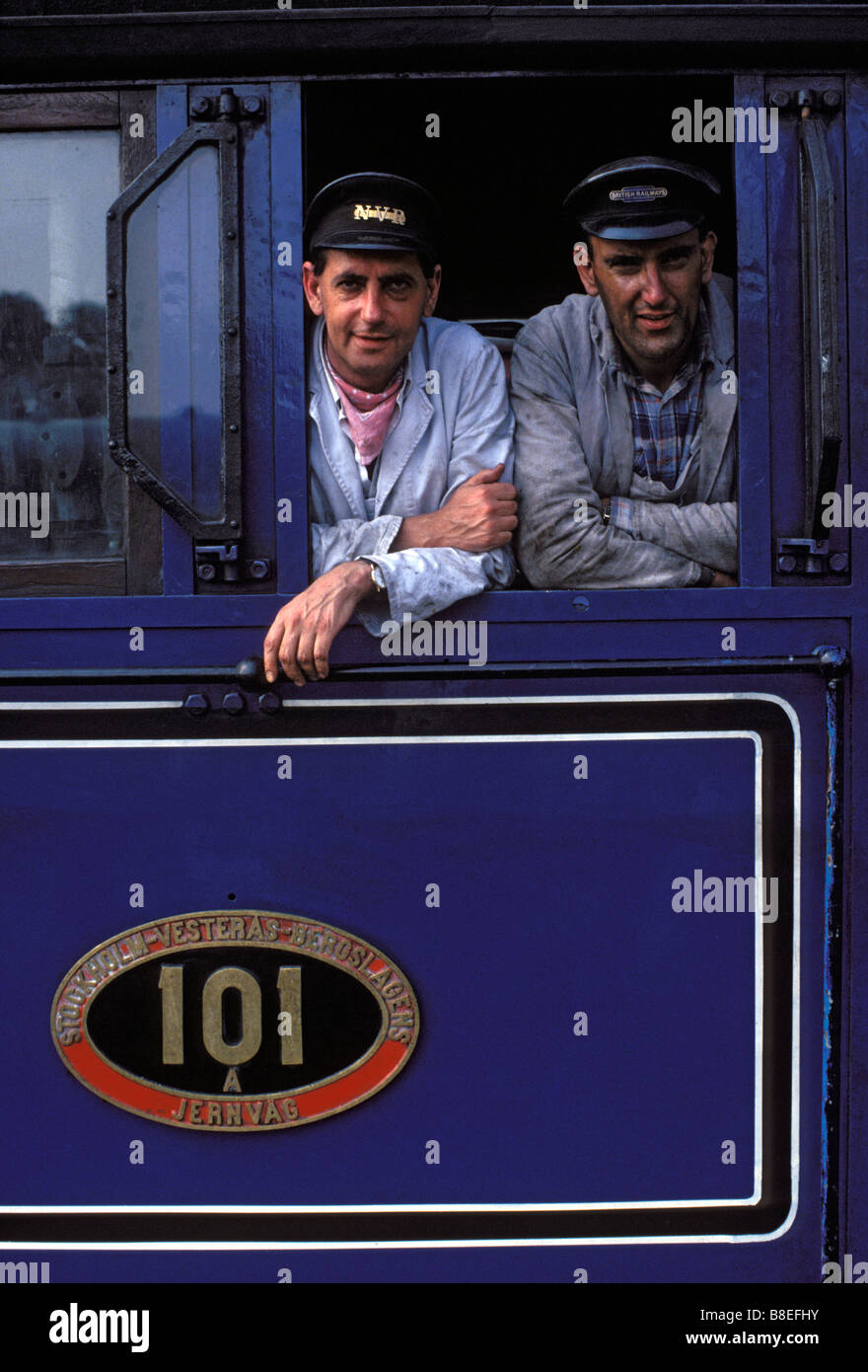 A steam train driver and his mate pose for a picture on board the Swedish 'B' class 4-6-0, No. 101. Nene Valley Railway England Stock Photo