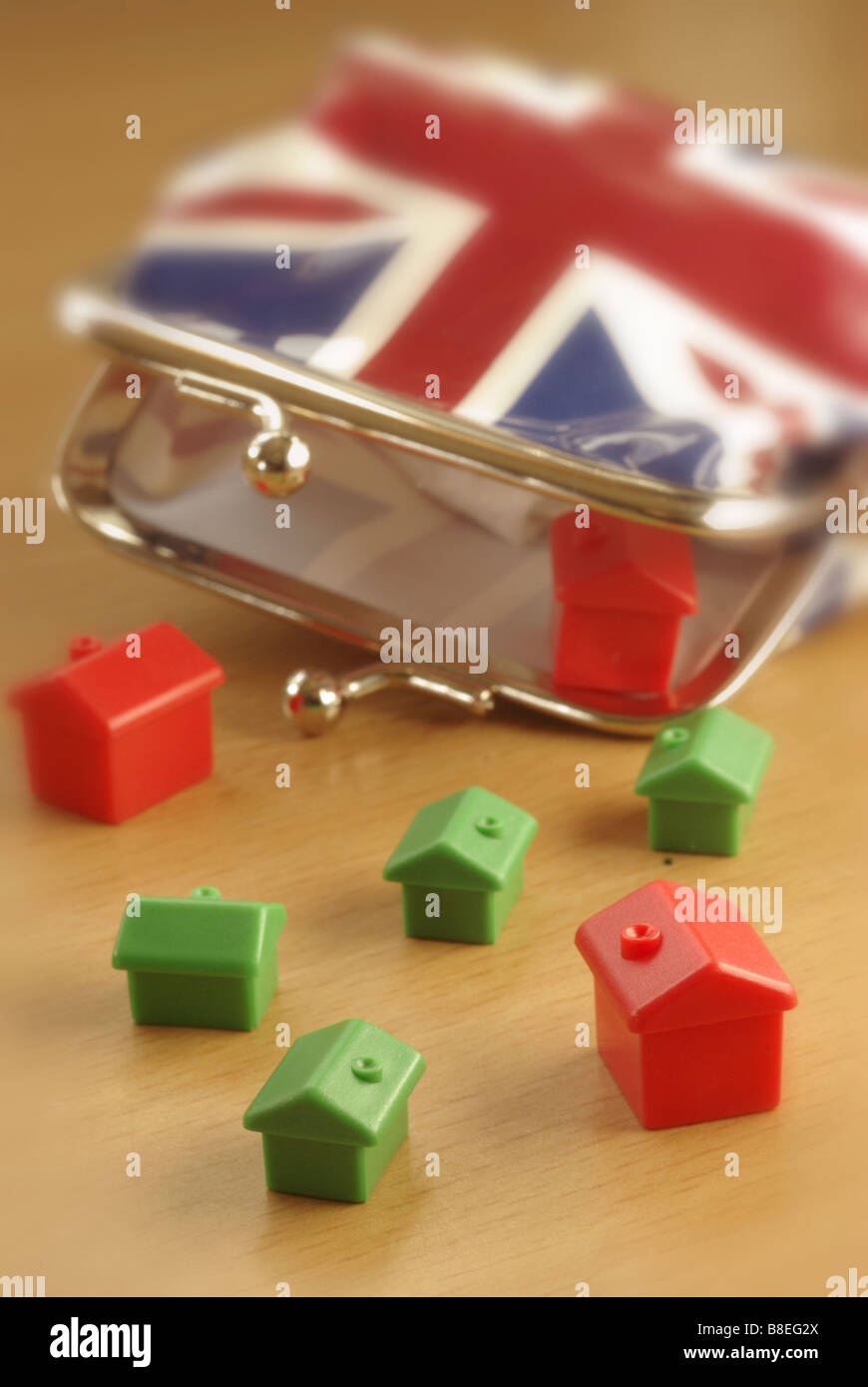 British Purse with homes spilling out (Mortgage) Stock Photo