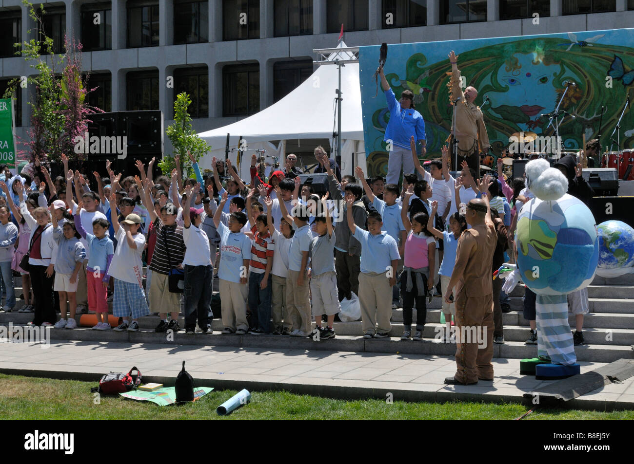 children perform fun happy stage earth day los angeles Stock Photo Alamy