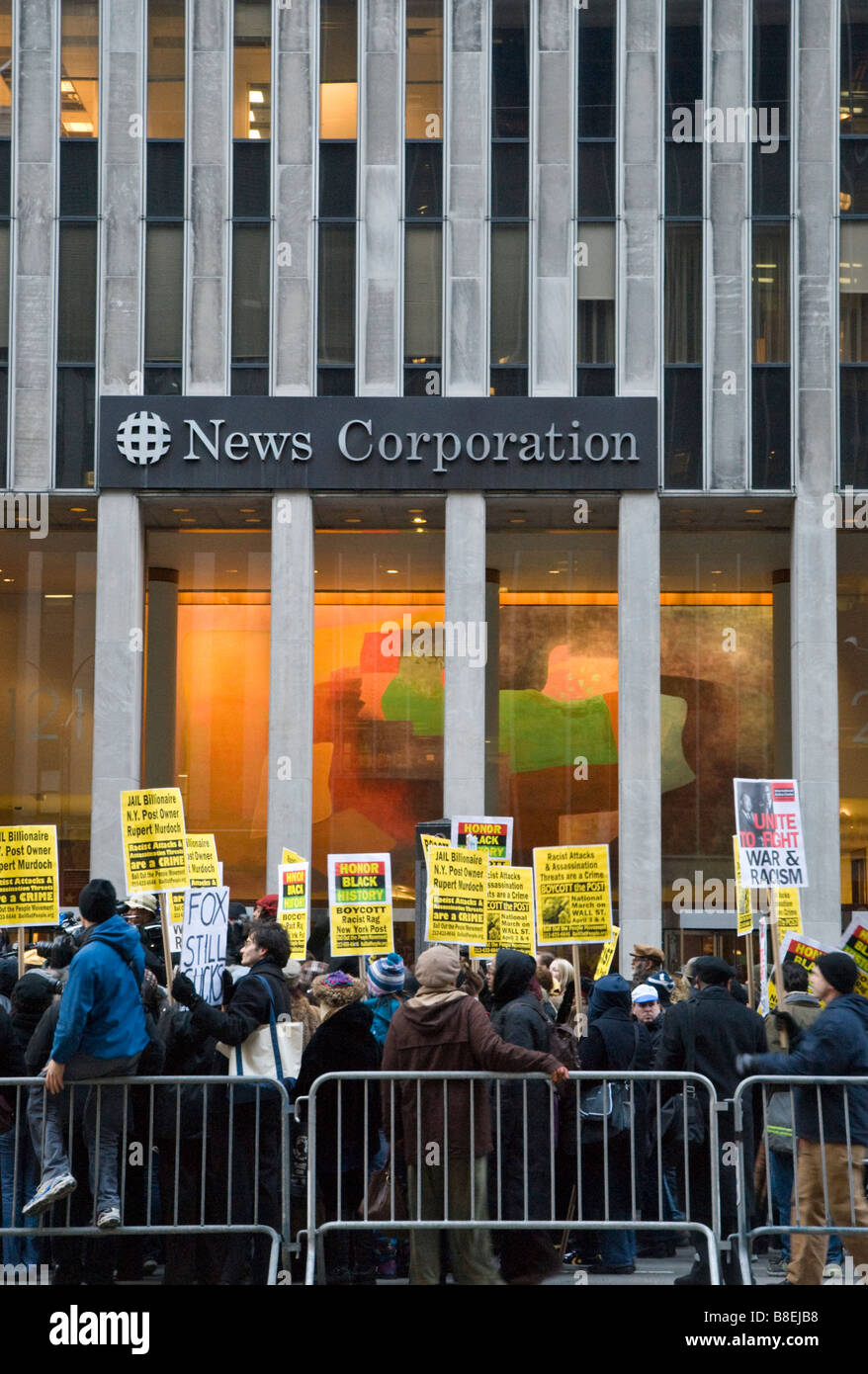People gather outside the News Corporation on 2-20-09 to protest the publication of a racist cartoon in the NY Post Stock Photo