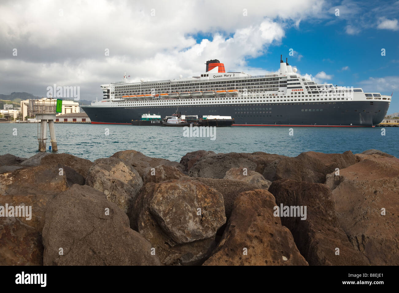 The Queen Mary 2 cruise ship docked on a stop during around the world