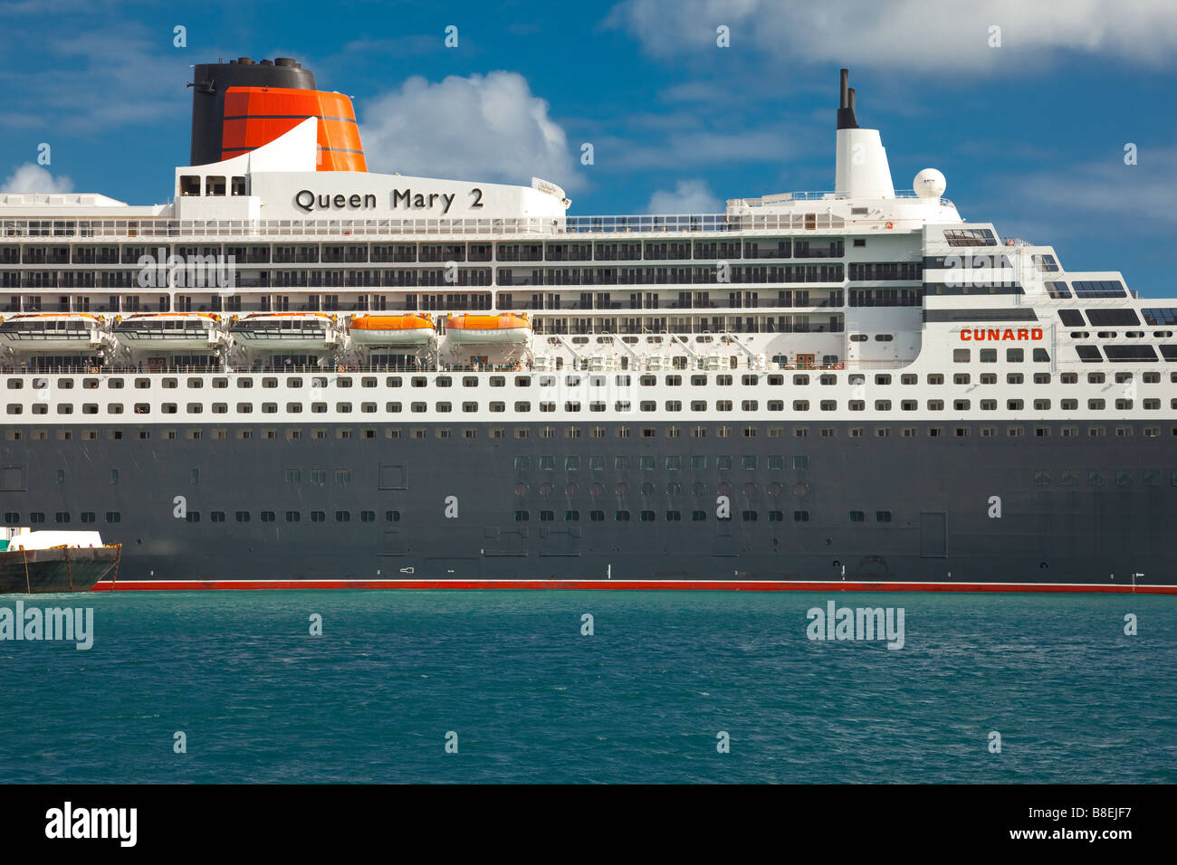 The Queen Mary 2 cruise ship docked on a stop during around the world  cruise Stock Photo - Alamy