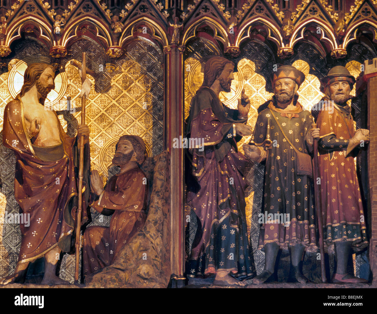Wood sculptures depicting life of Jesus Christ on side of chancel inside Notre Dame in Paris France Stock Photo