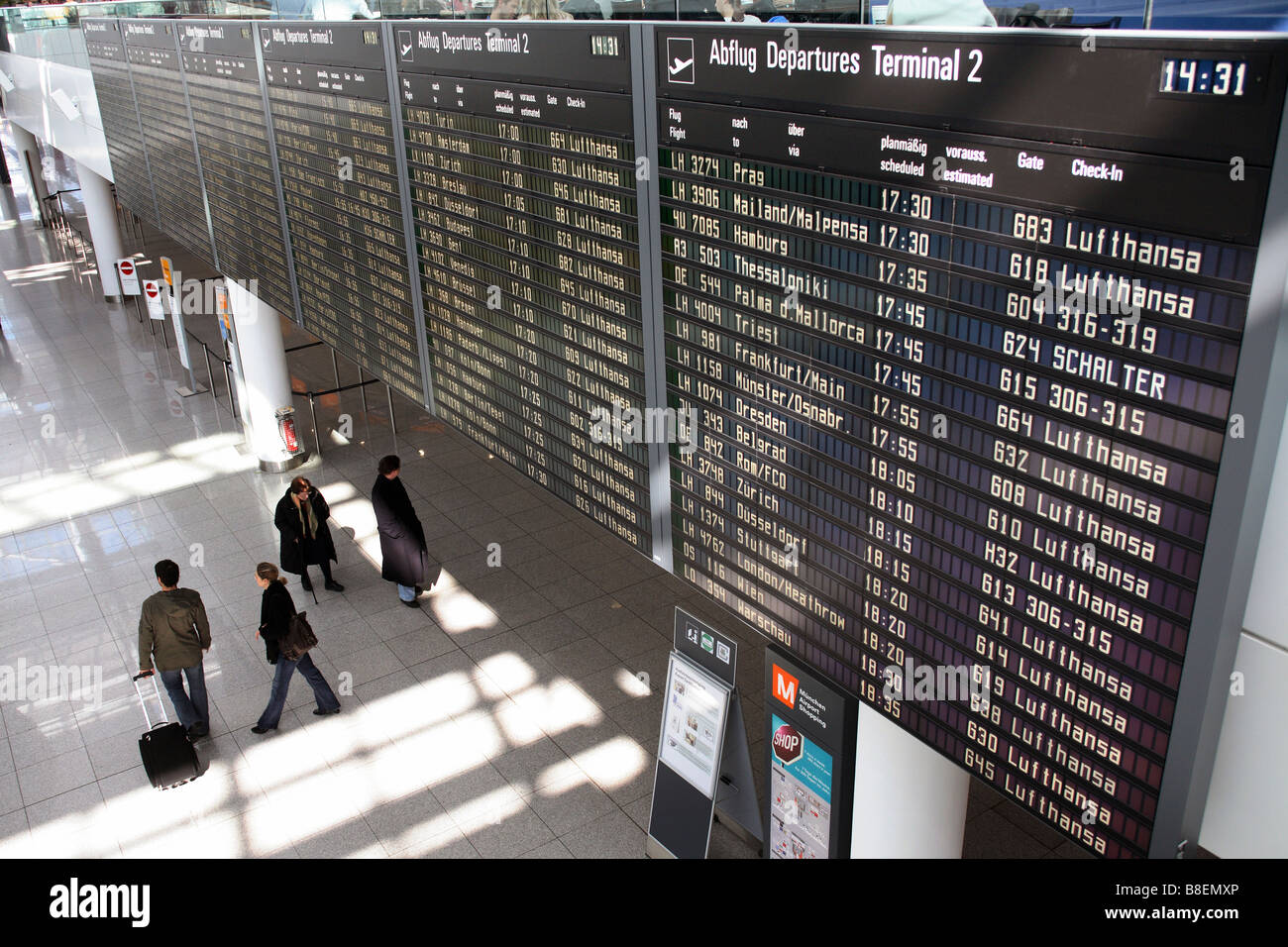 Departure/Arrival timetable at the Munich airport, Germany Stock Photo