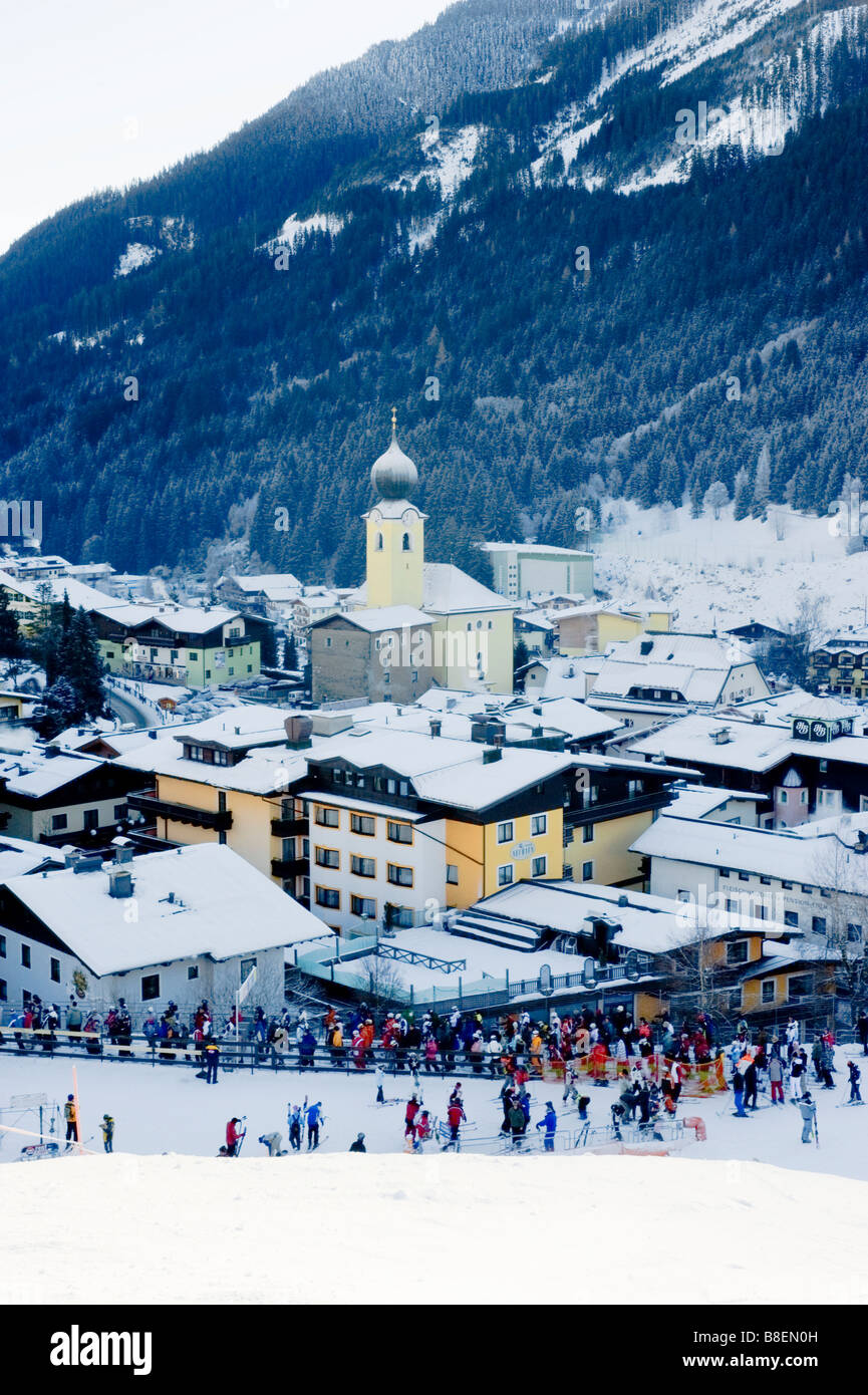 Saalbach in snow with people skiing Austria Stock Photo