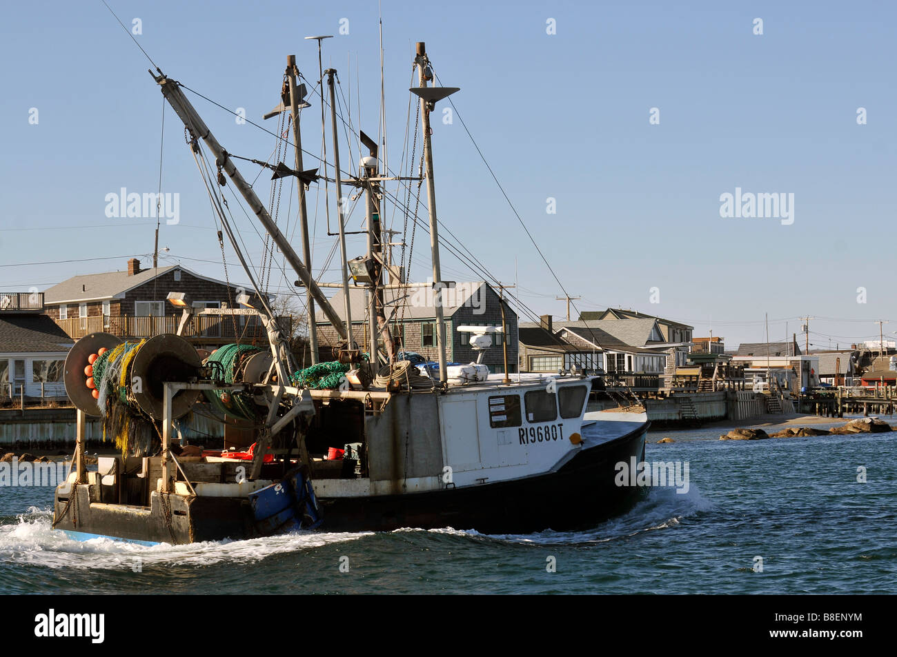 Commercial fishing boat returning to port in Galilee rhode island Stock