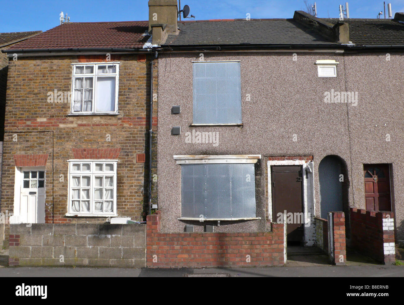 Boarded up terraced house Stock Photo