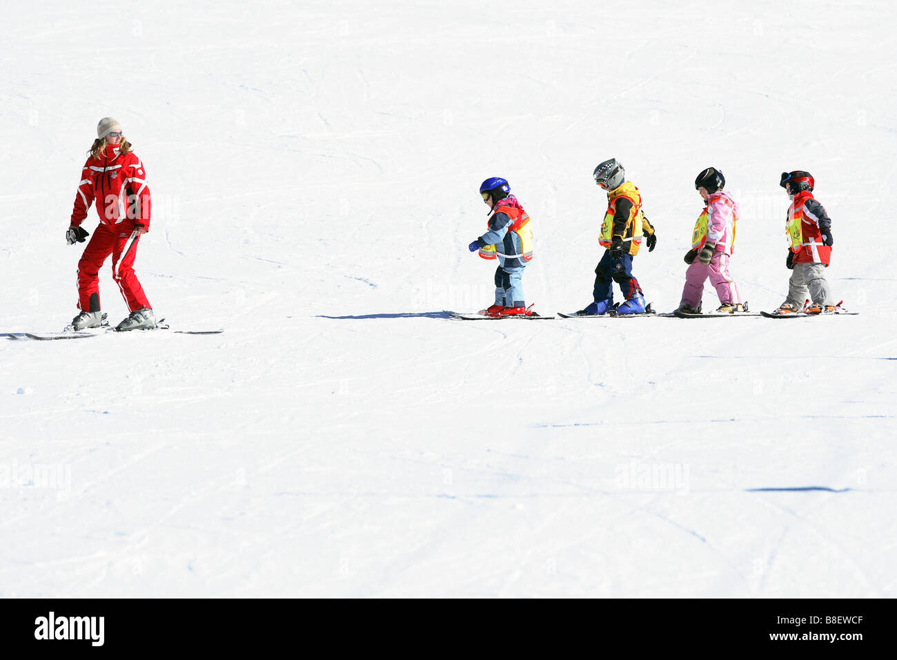Kids learning skiing Stock Photo